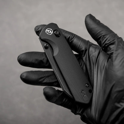 Olitans King Penguin G062-BB - 3.35" 14C28N Black Blade, Black G10 Handle