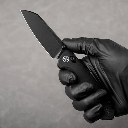 Olitans King Penguin G062-BB - 3.35" 14C28N Black Blade, Black G10 Handle
