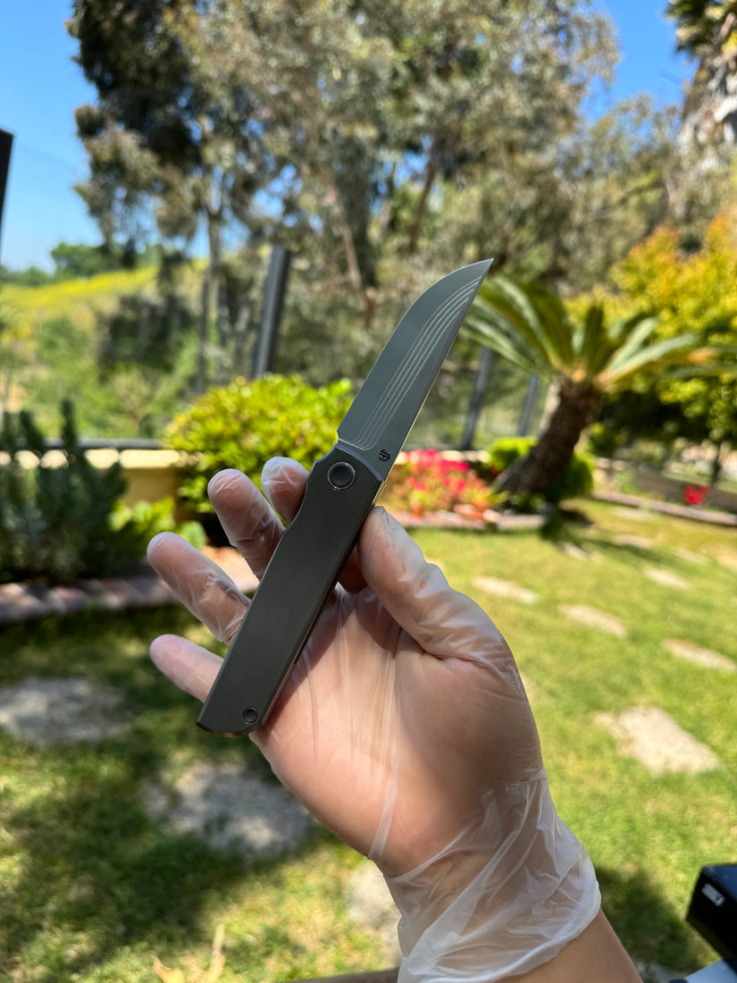 North Mountain Blade Kwaiken Salmon Layered Damascus - 3.4" ZDP-189 Core Steel Drop Point Blade, Titanium Handle