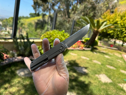 North Mountain Blade Kwaiken Salmon Layered Damascus - 3.4" ZDP-189 Core Steel Drop Point Blade, Titanium Handle