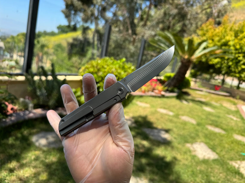 North Mountain Blade Kwaiken Salmon Layered Damascus - 3.4" ZDP-189 Core Steel Drop Point Blade, Titanium Handle