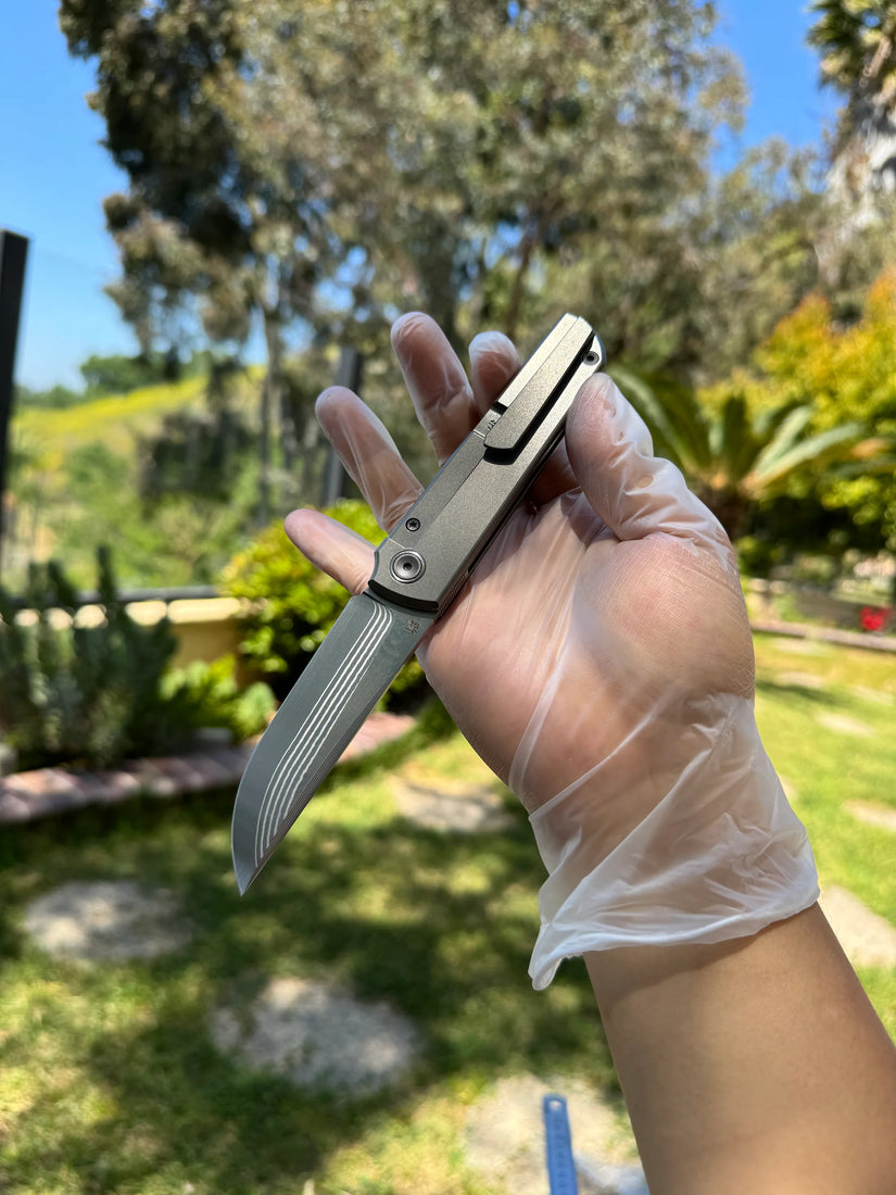 North Mountain Blade Kwaiken Salmon Layered Damascus - 3.4" ZDP-189 Core Steel Drop Point Blade, Titanium Handle