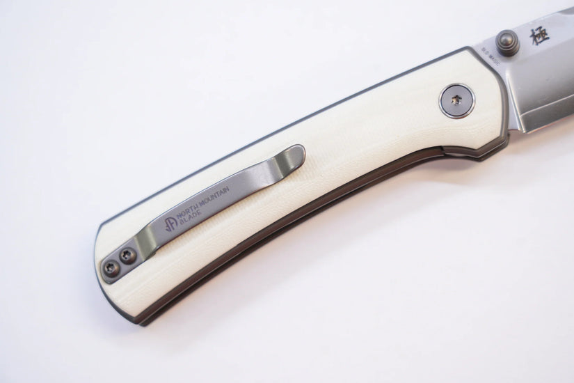 North Mountain Blade Ultra G10 - 3" SLD-Magic Steel Drop Point Blade, White G10 Handle