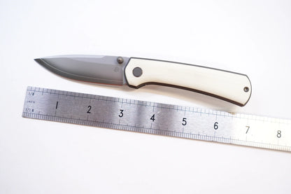 North Mountain Blade Ultra G10 - 3" SLD-Magic Steel Drop Point Blade, White G10 Handle