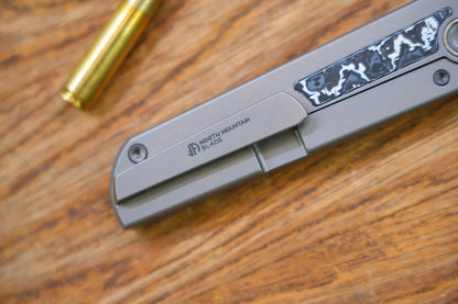 North Mountain Blade Chop Kick Stop Ti - 3.5" M390 Tanto Blade, Titanium with Ceramic Carbon Fibre Inlay Handle