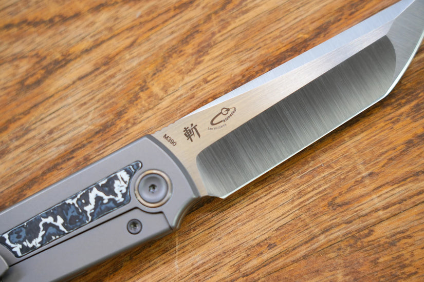 North Mountain Blade Chop Kick Stop Ti - 3.5" M390 Tanto Blade, Titanium with Ceramic Carbon Fibre Inlay Handle