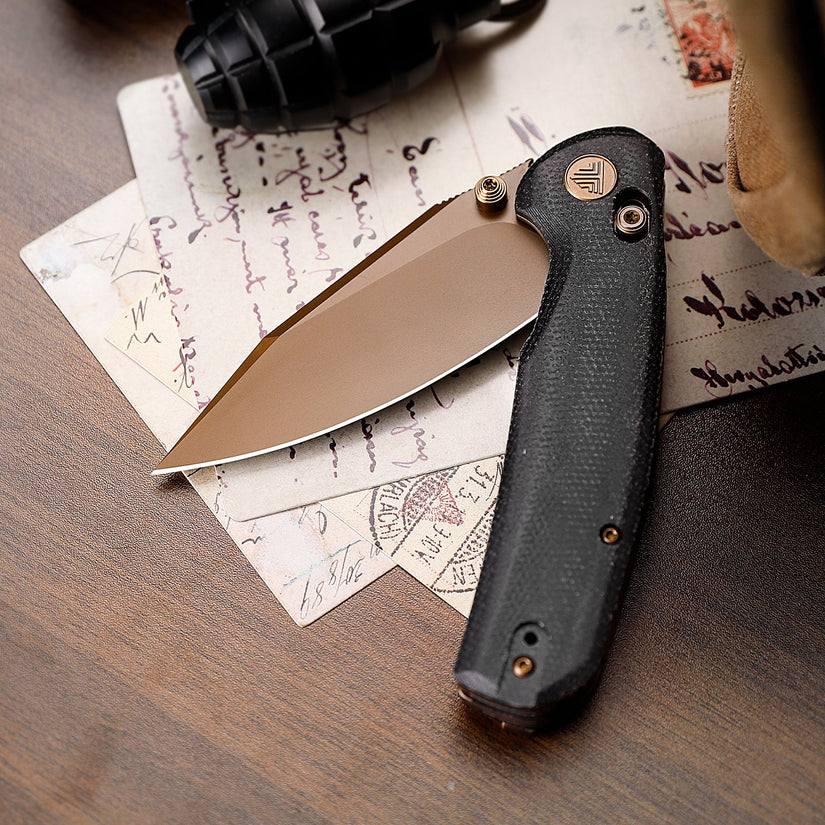 Trivisa Hornet-BM - 3.34" 14C28N Rose Gold Blade, Black Micarta
