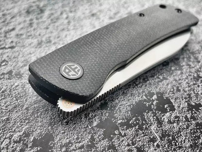 Petrified Fish Flavorist PFE05S - 3.15" K110 Satin Spear Point Blade, Black Micarta Handle, Front Flipper