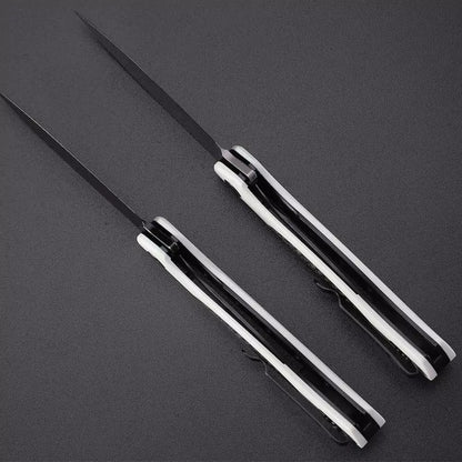 Petrified Fish Stamp PFB03 - 3.58" D2 Black Stonewashed Blade, Black G10 With Carbon Fibre Handle, Flipper