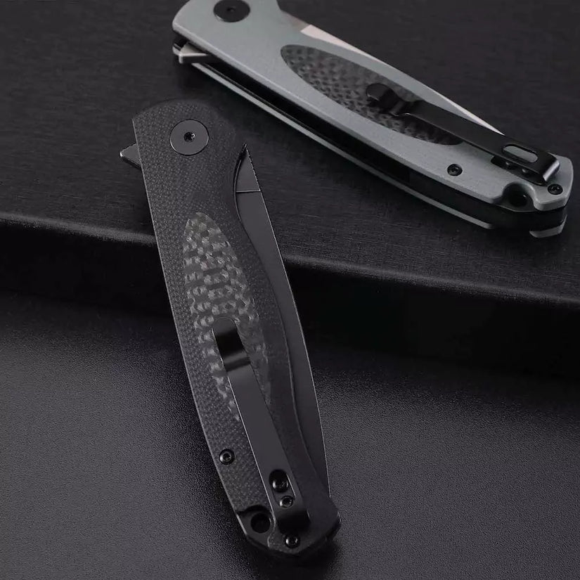 Petrified Fish Stamp PFB03 - 3.58" D2 Black Stonewashed Blade, White G10 With Carbon Fibre Handle, Flipper