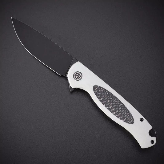 Petrified Fish Stamp PFB03 - 3.58" D2 Black Stonewashed Blade, White G10 With Carbon Fibre Handle, Flipper